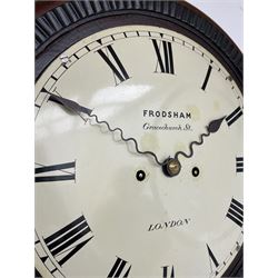 Frodsham of London - 8-day chain driven twin fusee wall clock in a mahogany case c1870, veneered case inlaid with brass stringing and motifs, shaped earpieces and chisel shaped base with pendulum adjustment door, 10” painted steel dial with Roman numerals, minute track and blued serpentine steel hands, dial inscribed Frodsham, Gracechurch Street, London, chain fusee, five-pillar, rack striking movement striking the hours on a cast bell. With pendulum.
H65 W34 D18
George Edward Frodsham, son of John Frodsham is recorded as working in Gracechurch Street, London 1869-79. Succeeded to Frodsham & Baker
