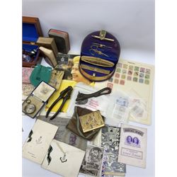 Two Swarovski swans, cased manicure set, 'Vogue' compact, nutcrackers with lion mask decoration, vesta case in the form of a book, ephemera relating to The Royal Family, small number of stamps in packets and on album pages, costume jewellery etc