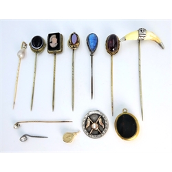  Two diamond and pearl gold stick pins tested 14ct, Victorian garnet cabochon gold stick pin tested 9ct, gold agate fob stamped 10c, agate stick pins etc  