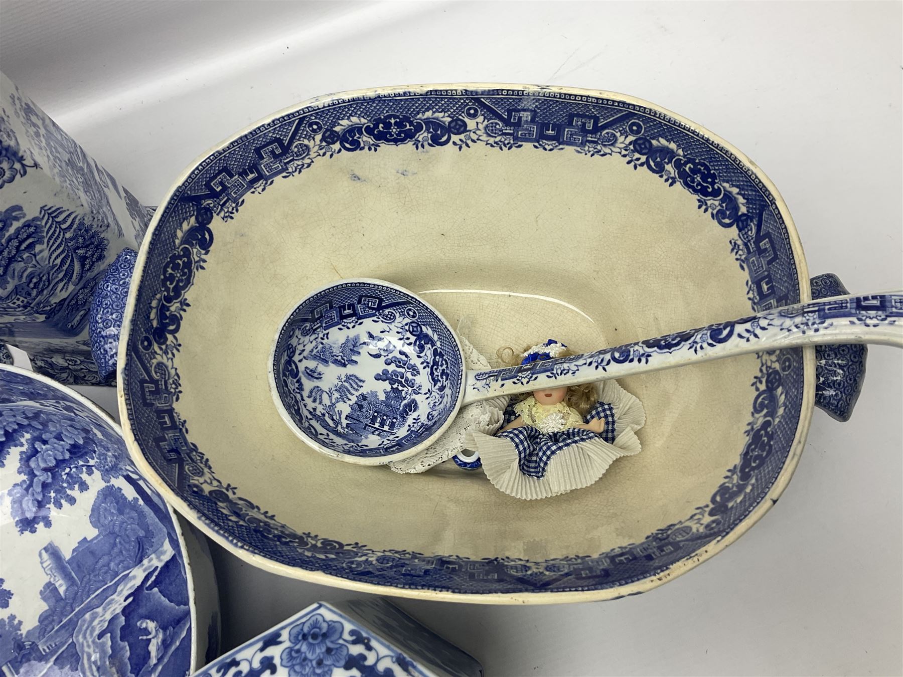 Large blue and white twin handled tureen with cover, Copeland Spode bowl, oriental blue and white jar and cover and a pair of blue and white vases