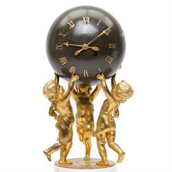 French- late 19th century 8-day globe clock, patinated globe with applied gilt Roman numerals, arrow-shaped hands and supported by three ormolu putti on a stepped columnar white marble base with a floral garland mount, twin train Parisian movement by Japy Freres with a recoil anchor escapement and countwheel strike, sounding the hours and half-hours on a bell. With pendulum.