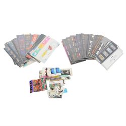 Queen Elizabeth II mint decimal stamps, mostly in presentation packs, face value of usable postage approximately 380 GBP