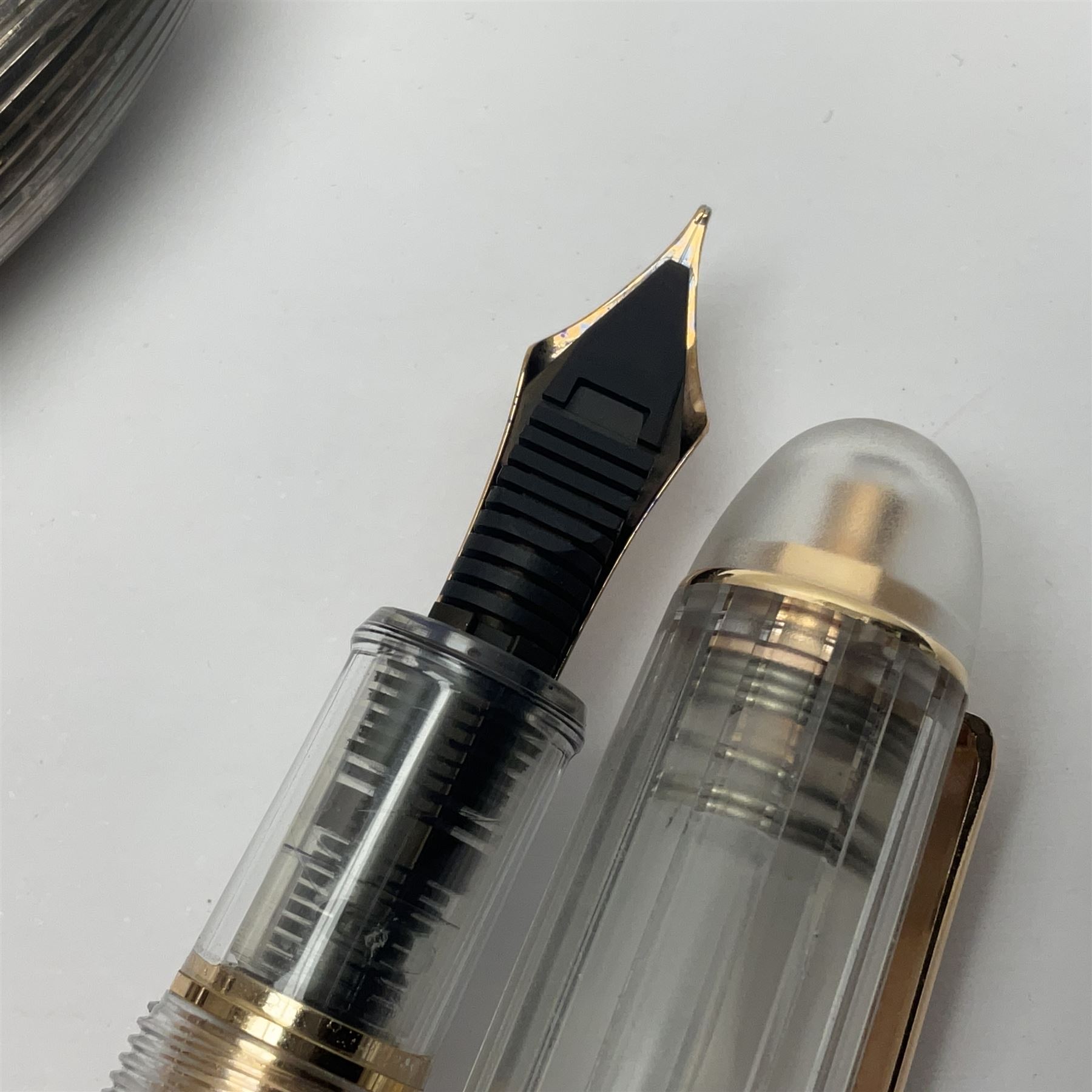 Cross sterling silver fountain pen, having fluted barrel and cap, stamped 