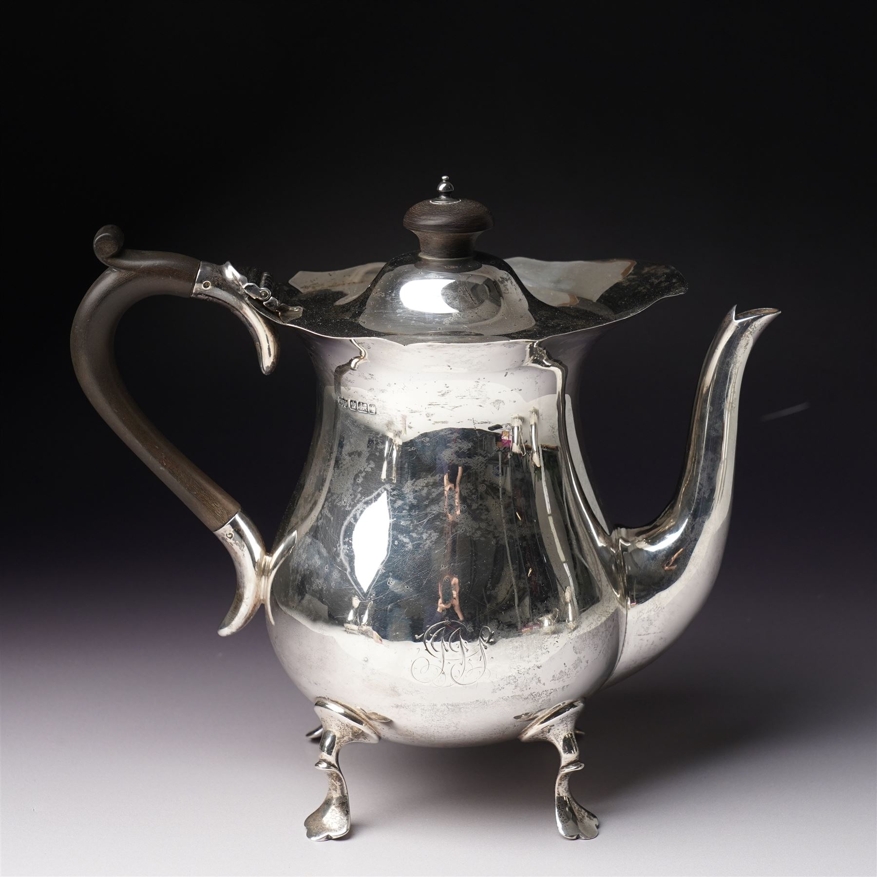 Silver matched five piece tea and coffee set of baluster form engraved with a monogram on shaped supports Sheffield 1913, the teapot 1911, the coffee pot 1924 Maker Mappin & Webb
