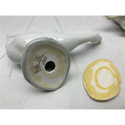 Seven Lladro figures, comprising Playful Puppy no 9135, Platero and Marcelino/Boy Hugging Donkey no 1181, Mini Seal Family no 5318, Attentive Polar Bear no 1207, Seated Polar Bear no1209, Eskimo Boy with Pet no 5238 and Girl with Geese no 1035, together with Nao goose