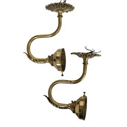 Victorian brass candlestick wall sconce, together with pair of brass wall lights and one other 