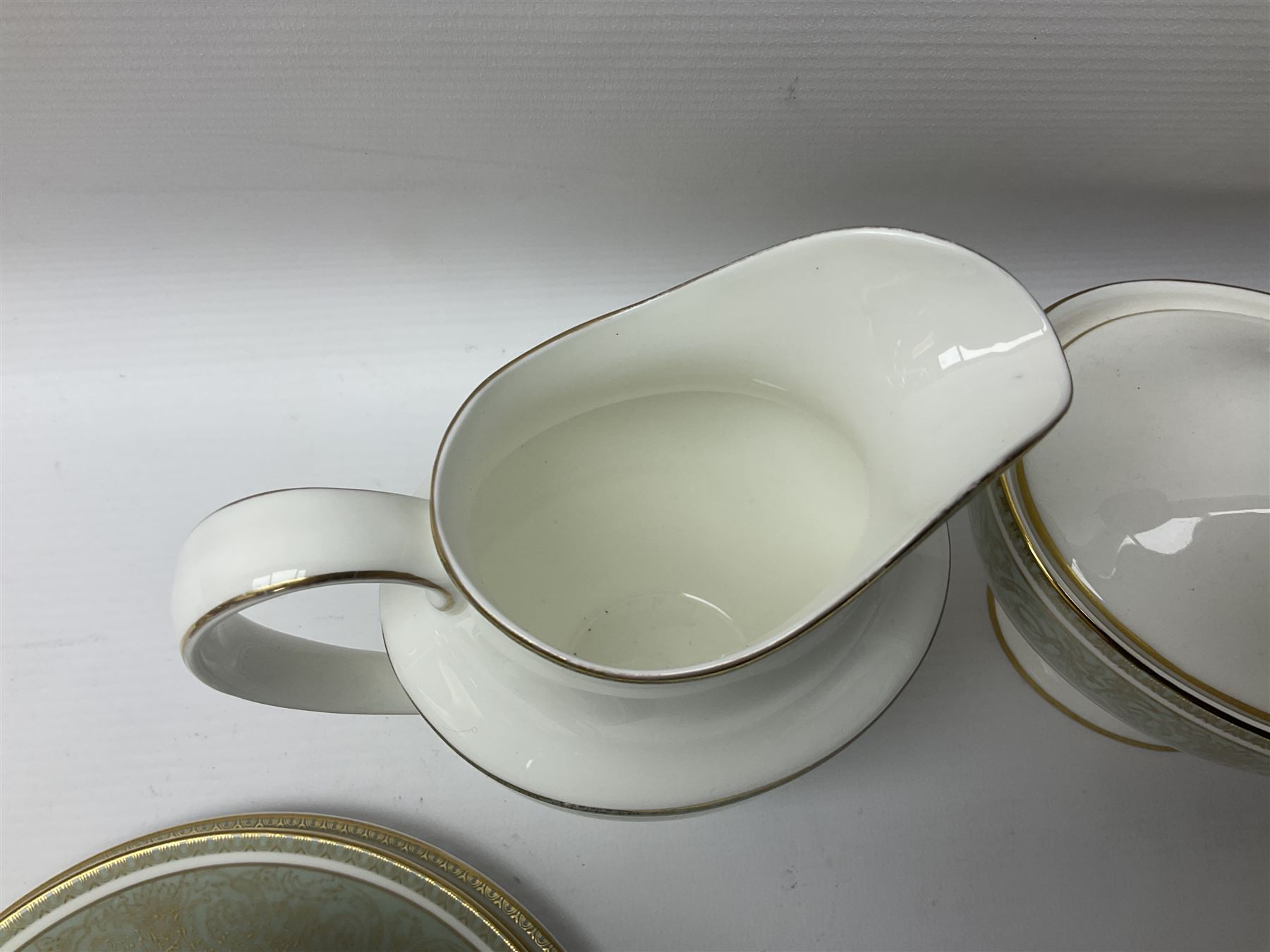 Royal Doulton English Renaissance pattern tea service, comprising teapot, milk jug, open sugar bowl, covered sugar bowl, seven cups, eight saucers and eight side plates (27)