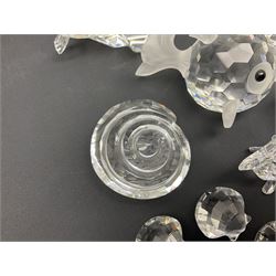 Nineteen Swarovski Crystal sea creatures, to include dolphins, seals, puffer fish, octopus, crabs, together with a quantity Swarovski Crystal shells 