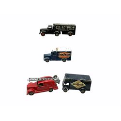 Timpo Toys - four unboxed and playworn die-cast commercial vehicles comprising Smiths Crisps van; Pickfords Removers van; Ever Ready van; and Fire Engine with ladders (4)