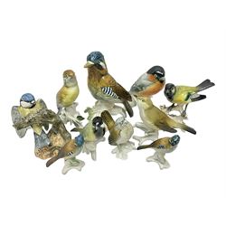 Eight Karl Ens bird figures, together with Mack blue tit and one other