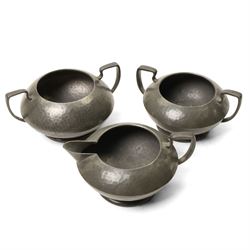 Quantity of Tudric pewter including small hammered pedestal bowl, milk jugs, sugar bowls etc and a WMF dish with Dutch figures No261