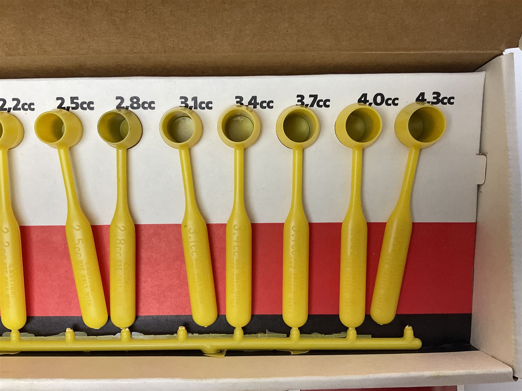 RCBS single station loading press with shell holder and powder funnel; and boxed Lee Powder Measure Kit