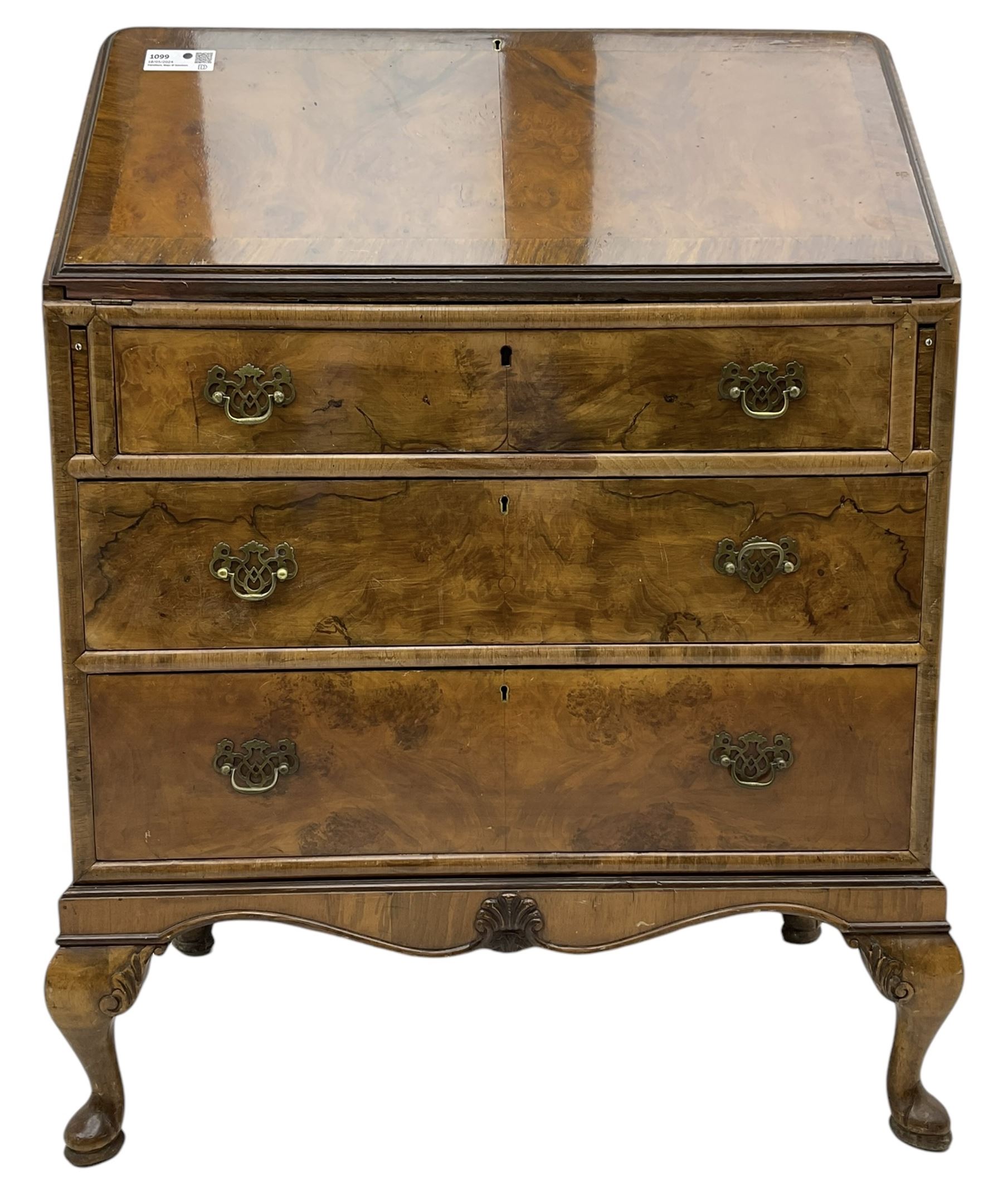 Mid-20th century walnut bureau desk, figured fall front enclosing fitted interior, three graduating drawers below, on cabriole feet