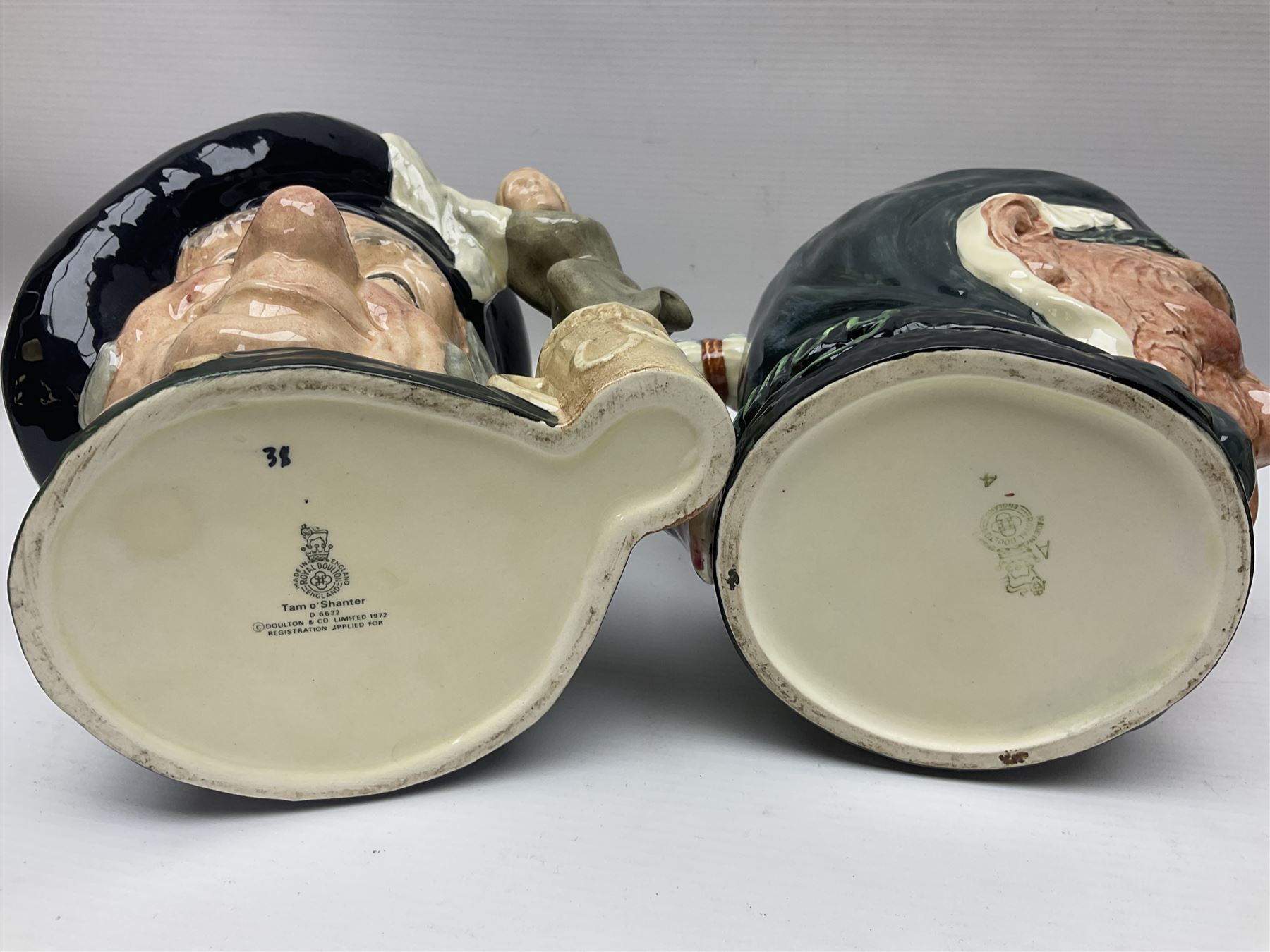 Large collection of Royal Doulton character jugs, to include Robinson Crusoe D6532, Tam O Shanter D6632, The Falconer D6533 etc, together with similar charater jugs and toby jugs   