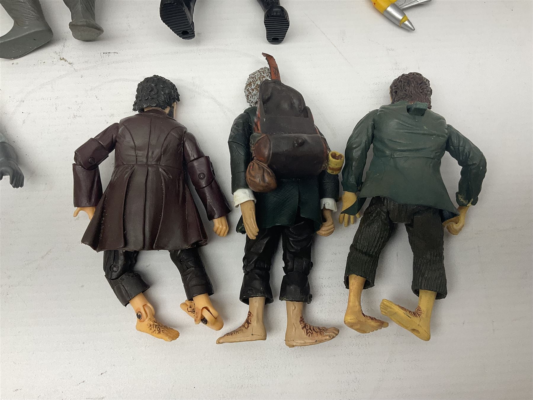 Collection of 80s-00s collectable figures from Lord of the Rings, Masters of the Universe, Thunderbirds etc