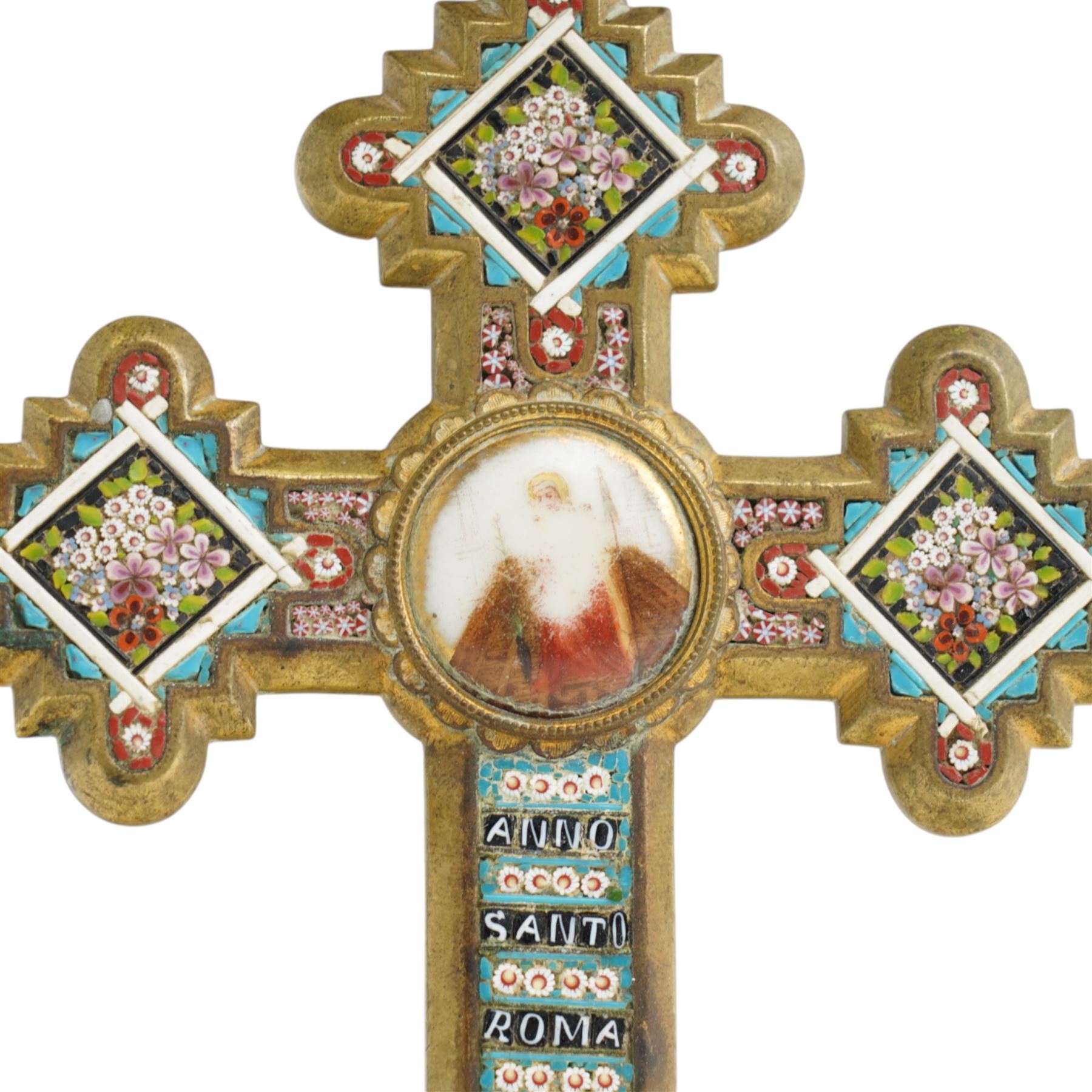 Italian micro mosaic cross, the central panel depicting a solitary female figure, each point decorated with sprigs of flowers, the inscription reading 'Anno Santo Roma 1900', H14cm