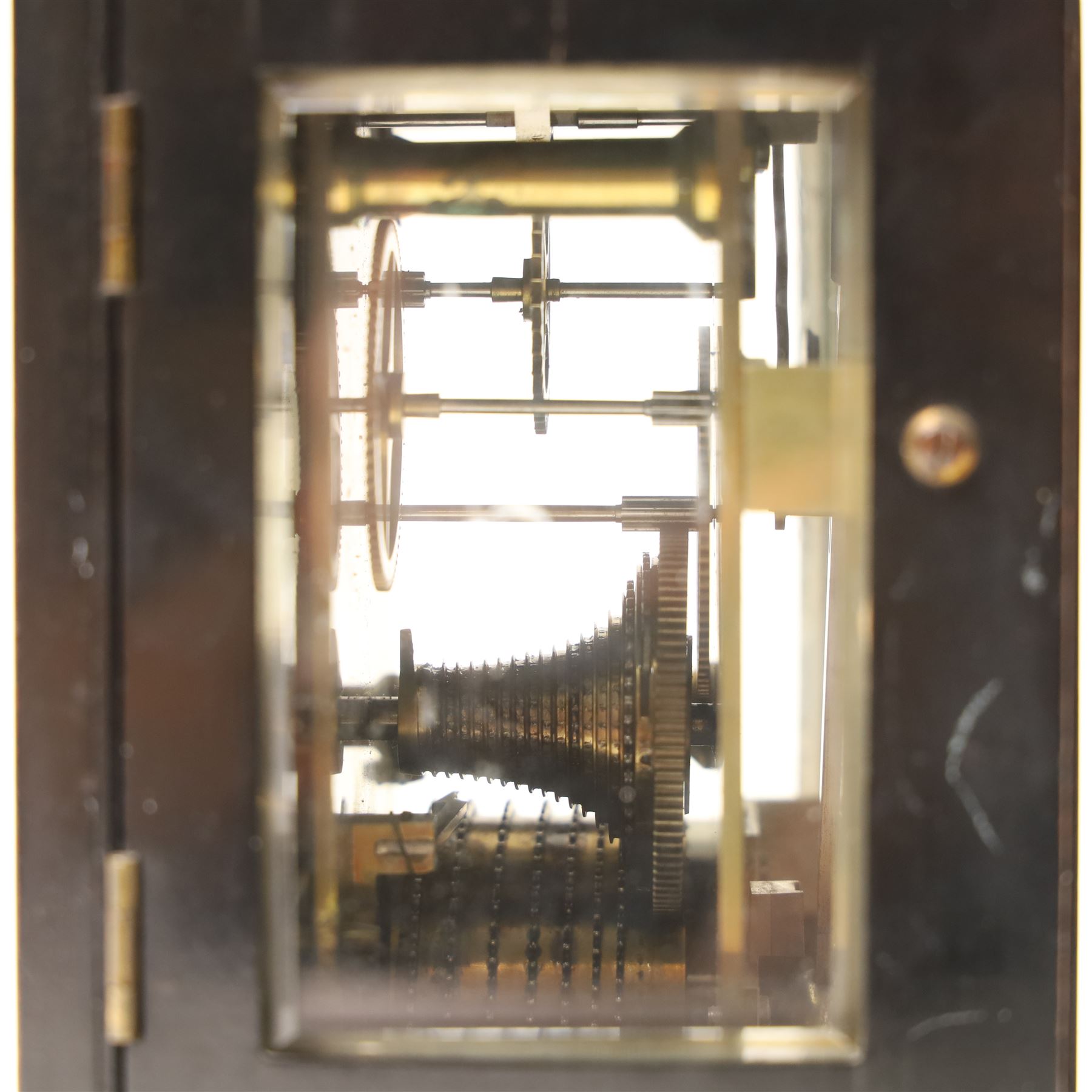 Early Victorian mantel clock, the brass dial inscribed Barraud and Lund, Cornhill, London, No 1543 with chain fusee, plain brass back plate in ebonised case with serpentine top H23cm
