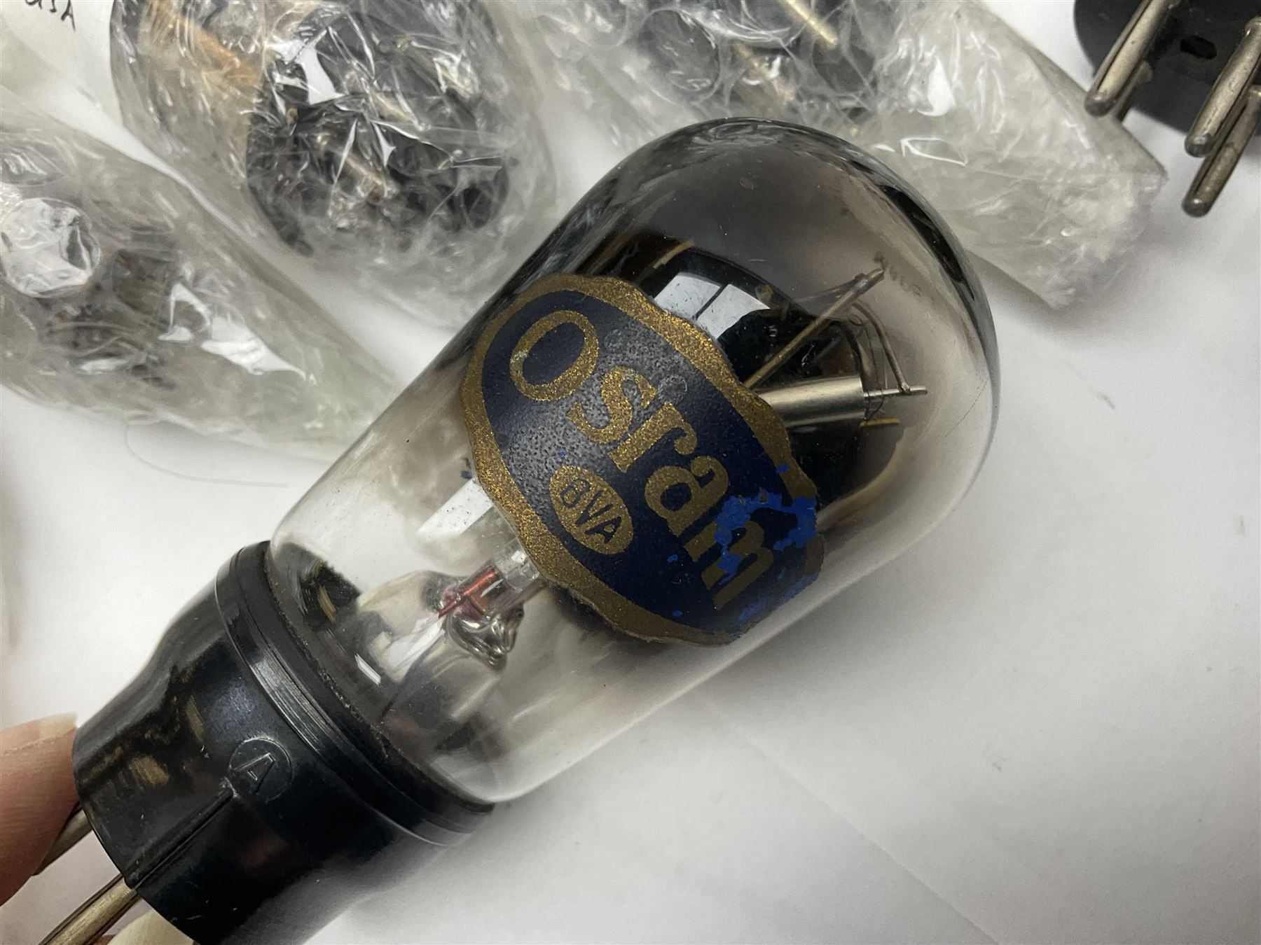 Collection of Osram, Elpico, Sylvania and similar thermionic radio valves/vacuum tubes, including P2, L21, DH77 GK9, U14 and PCLl86, approximately 19 as per list, unboxed