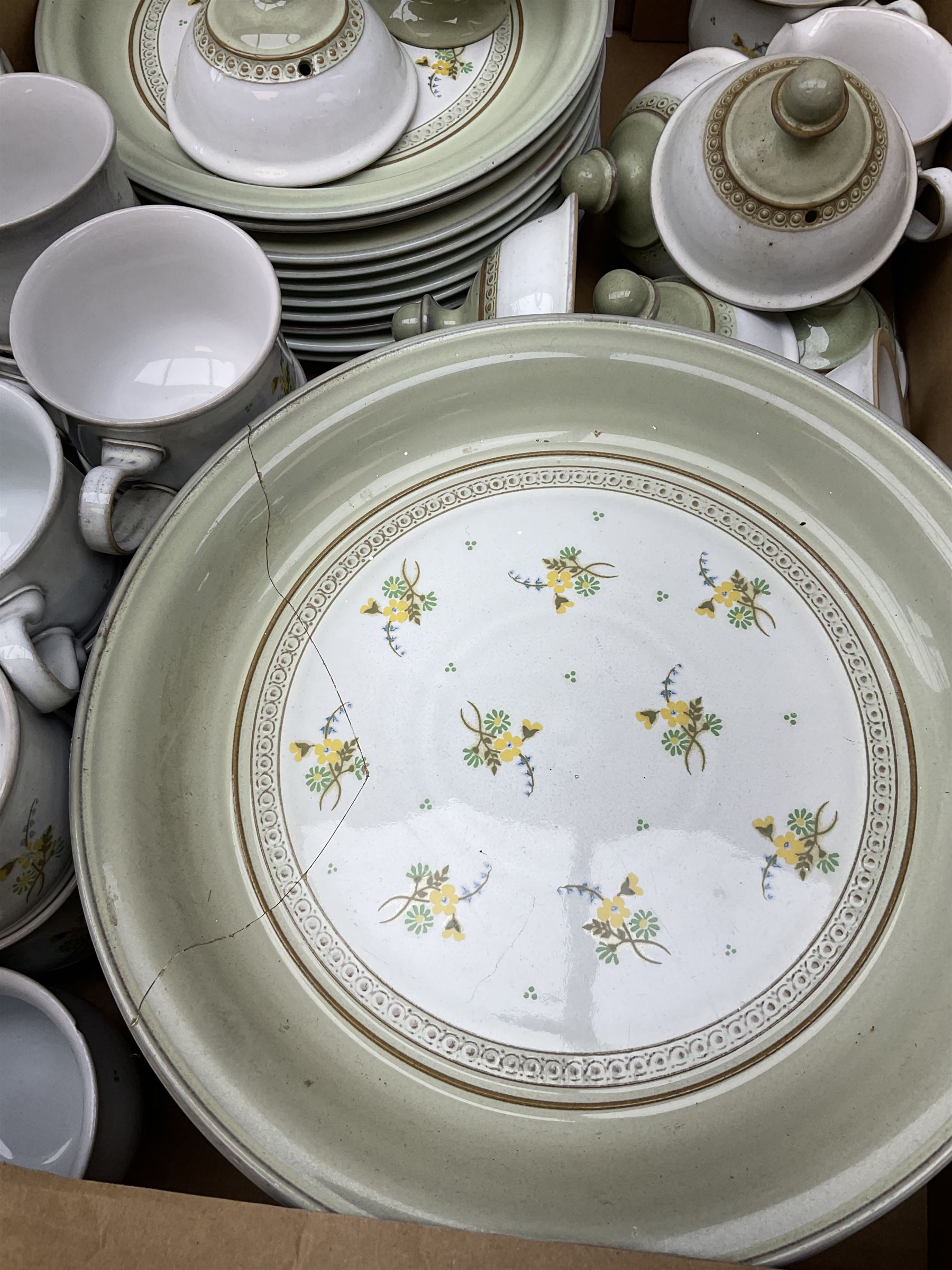 Quantity of Denby Verona pattern tea and dinner wares, decorated with floral sprays and within green borders, to include lidded twin handled bowls, teacups and saucers, dinner plates etc in two boxes