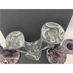 Daum glass two stemmed candle stick signed to verso, together with a pair of slag glass purple candle sticks, Daum H21cm