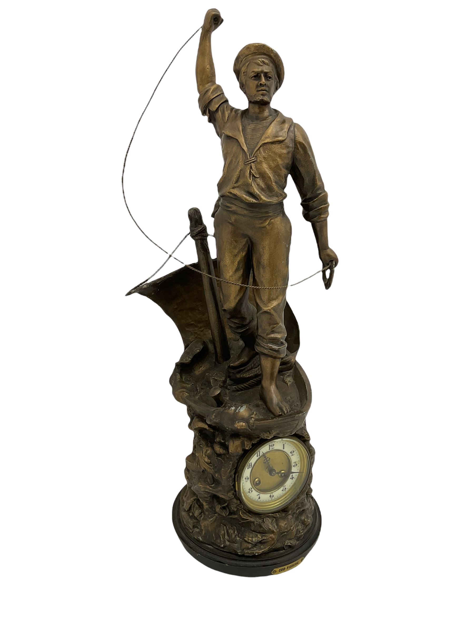 An imposing bronzed spelter clock depicting a 19th century  fisherman, on a circular ebonised base with a plaque entitled “Cod Fishing” with a Parisian eight-day striking movement striking the hours and half-hours on a coiled gong, two-part dial with a gilt centre, ivorine chapter inscribed with upright gothic Arabic numerals and minute markers, with steel gothic hands within a brass bezel and flat bevelled glass. With pendulum.   



