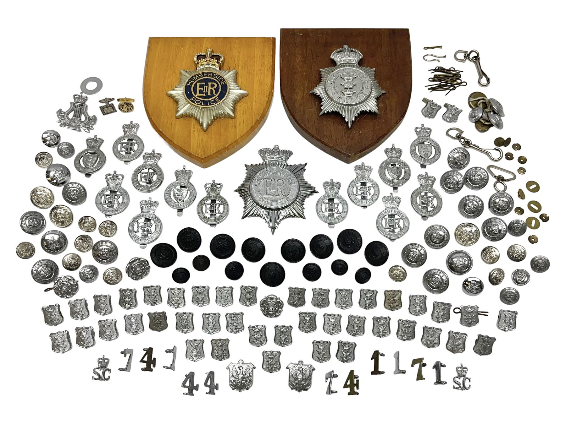 Police - large quantity of cap and collar badges, collar numbers and buttons for Hull City Police, Humberside Police, Lincolnshire Constabulary, York & North East Yorks Police etc; all queen's crown; and three helmet plates including one king's crown
