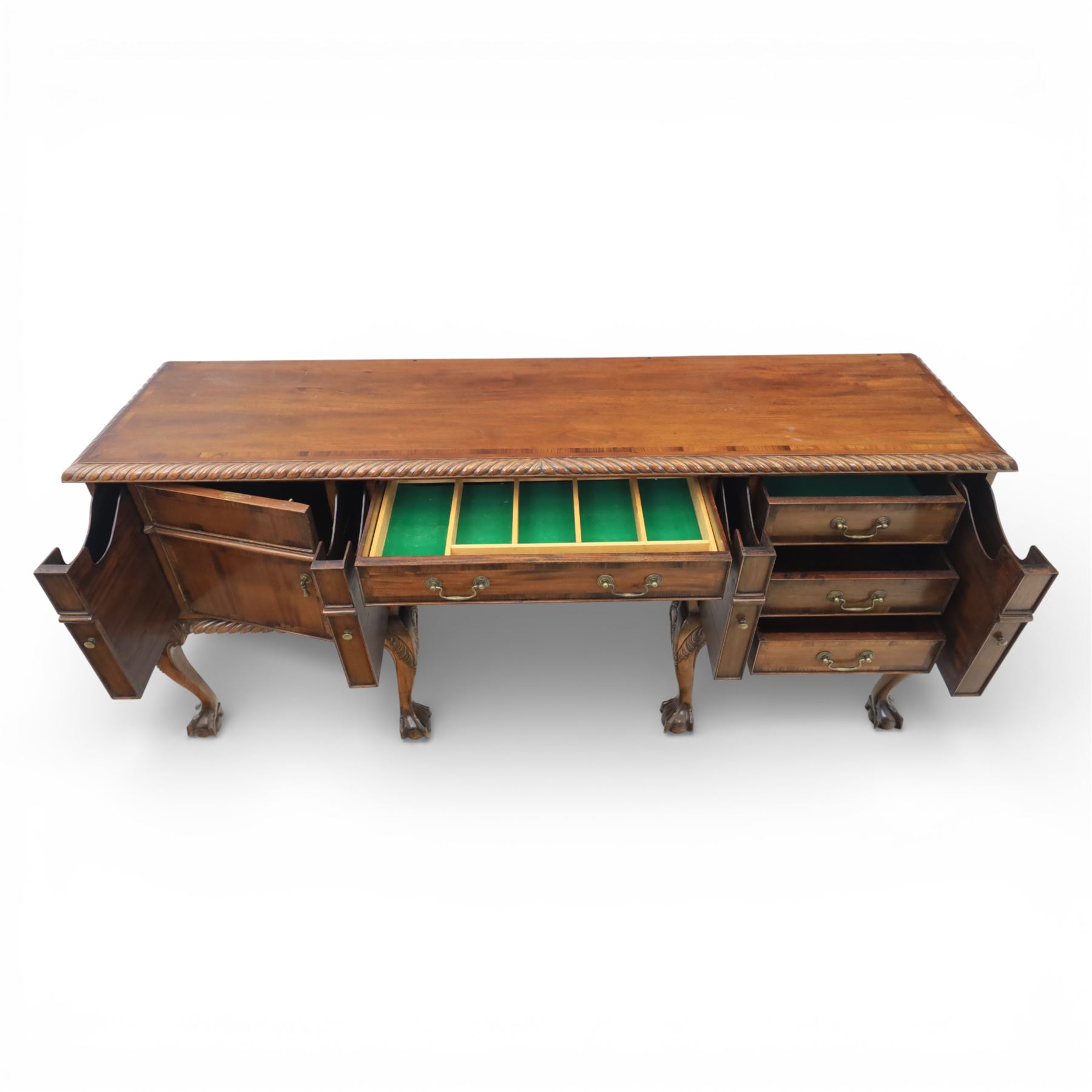 Georgian design mahogany sideboard, the rectangular top with moulded gadrooned edge, fitted with a central frieze drawer flanked by cupboard doors, raised upon cabriole legs terminating in ball and claw feet