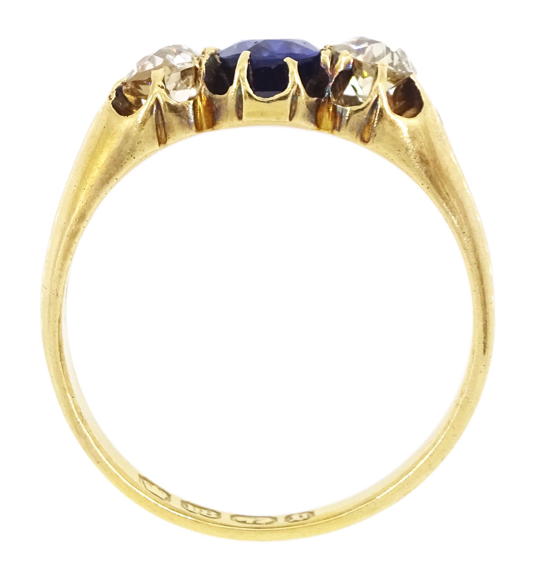 Victorian 18ct gold three stone oval cut sapphire and old cut diamond ring, Birmingham 1895, sapphire approx 0.90 carat, total diamond weight approx 0.55 carat