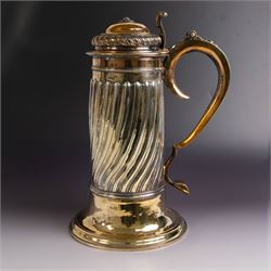 George I silver-gilt wine flagon, of tapering cylindrical form with part fluted body and u...