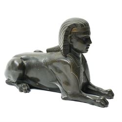 Bronze model of an Egyptian sphynx, W28cm 