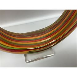 Three art glass sculpture, coiled form with multicolour stranded, upon clear glass plinth, unsigned, largest H27cm