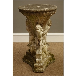  Weathered stone effect putti stand, H54cm  