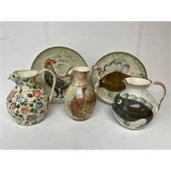 Collection of Yorkshire Moorlands Pottery, comprising two large circular dishes and three jugs, decorated with various fish, flowers, red grouse and cockerel