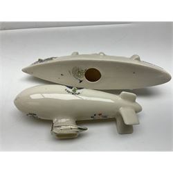 Ten WW1 crested china military models comprising submarine, four ships including Lusitania, four Zeppelins/balloons and an aircraft; various makers including Arcadian China, Swan China, Carlton China, Waterfall, Grafton China etc; various crests including Saint Neots, Great Yarmouth, Tewksbury, Swanage, Simons Town, Hull etc (10)