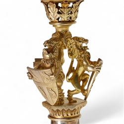 'The Herald's Tazza' limited edition silver ornamental cup, designed by Hector Miller and Tim Minett for Aurum, the sculptured gilt stem comprising three heraldic lions each bearing a coat of arms, decorated to the foot and bowl with gilt borders of repeating oak leaves and Tudor roses, no. 21/250, hallmarked Hector Miller, London 1985, H15cm, with certificate 