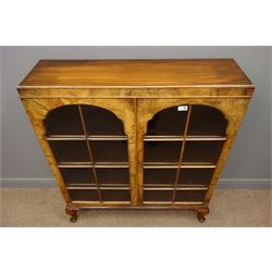  Maple & Co. figured walnut display cabinet, two stepped arched astragal glazed doors enclosing three shelves, cabriole supports, W96cm, H108cm, D29cm  