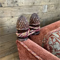 Knole type drop arm sofa with cushions in a traditional patterned upholstery,