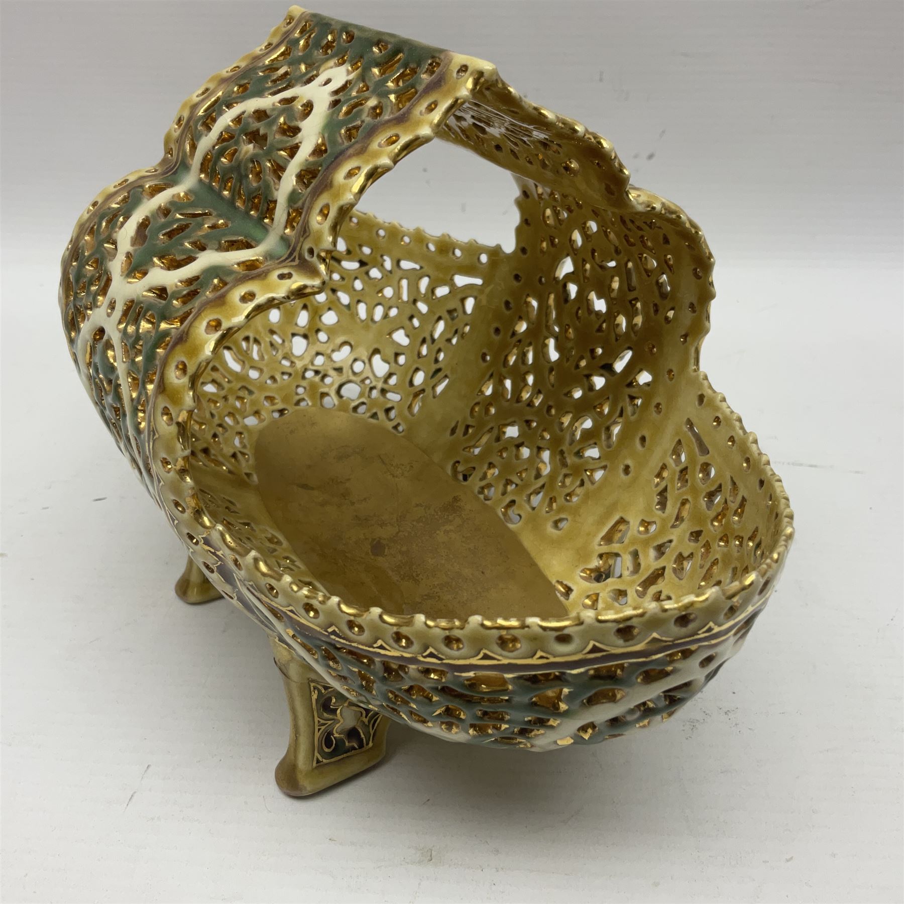 Hungarian Zsolnay Pecs gilt and green reticulated basket, upon four feet, with gold mark beneath, H14cm L21cm