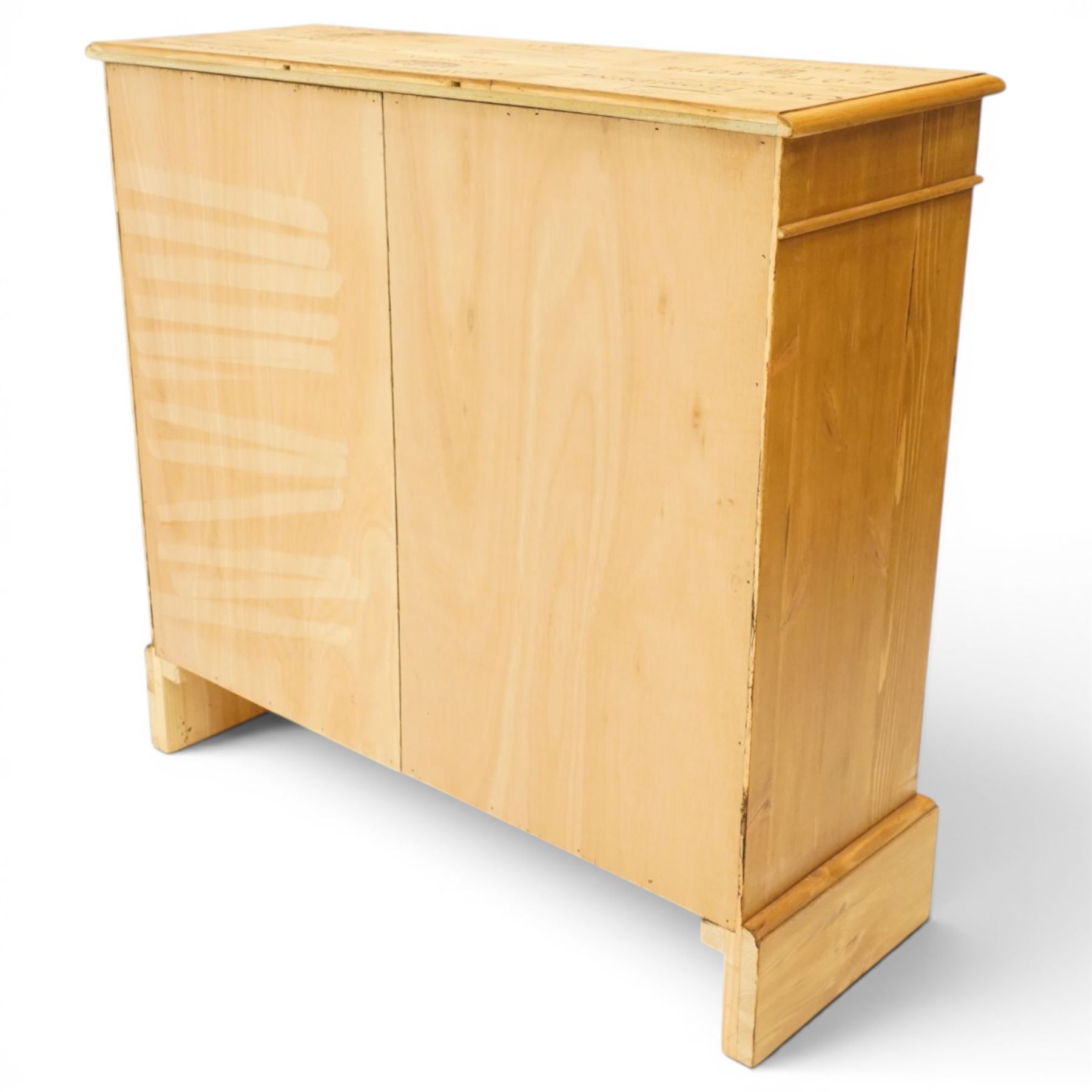 Traditional style pine wine rack, rectangular top with pyrography 'wine box' design, with apertures for fourty-eight bottles, on a plinth base