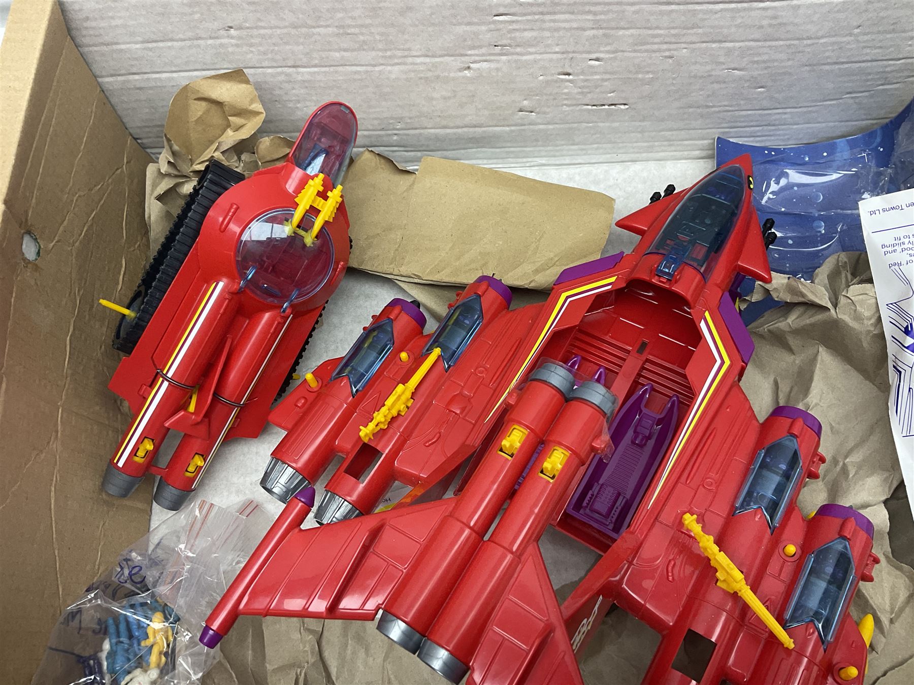 Two 1980s Bluebird Manta Force spaceship playsets - Red Venom and Entire Space Battle Force in one Gigantic Ship; both boxed with instructions.; and quantity of spare figures