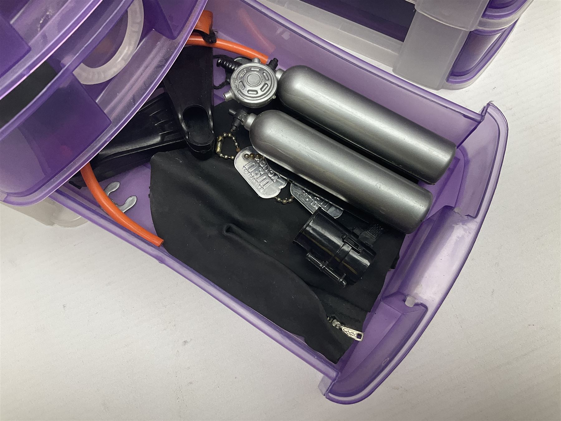 Action Man - five figures marked on the back 'Made in England by Palitoy under licence from Hasbro 1964', one dressed as a German Stormtrooper, one as a Red Devil Pilot and three in army uniform; another similar action figure marked to the right buttock ' G.I. Joe Copyright 1964 by Hasbro Patent Pending Made in Canada' dressed in army uniform; together with an Action Man jeep, field gun, mortar and machine guns and other accessories including helmets and weapons, parachute, diving equipment, skis and snow shoes, boots, uniforms etc; all unboxed