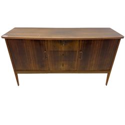 Peter Hayward for Vanson - mid-20th century teak sideboard, rectangular top with rounded corners over three central drawers, flanked by two cupboard doors enclosing shelves, raised on tapered supports