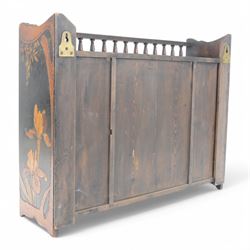 Japanese wall cabinet, the central hinged panel depicting a warrior opening to reveal single drawer, with two shelves to either side decorated throughout with floral and foliate decoration, H47cm