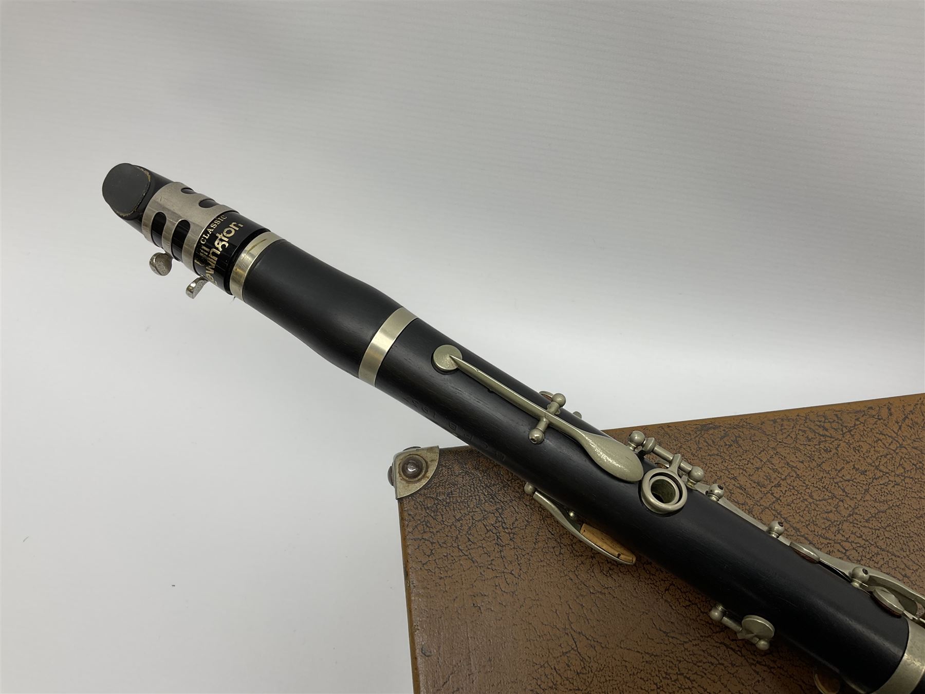 Buffet Crampon Paris African blackwood four-piece clarinet with nickel fittings, impressed 'BCPB 1937', multiple stamps for 'Macdonough & Son Sole Agent London' L67cm; in rexine covered case with two unused reeds. Biographical information: The Macdonagh family have links with the Royal Philharmonic Orchestra and are also reputedly linked with Thomas Macdonagh who was involved in the 1916 Irish uprising.