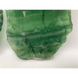 Pair of green fluorite slices, polished with rough edges, H16cm, L17cm  