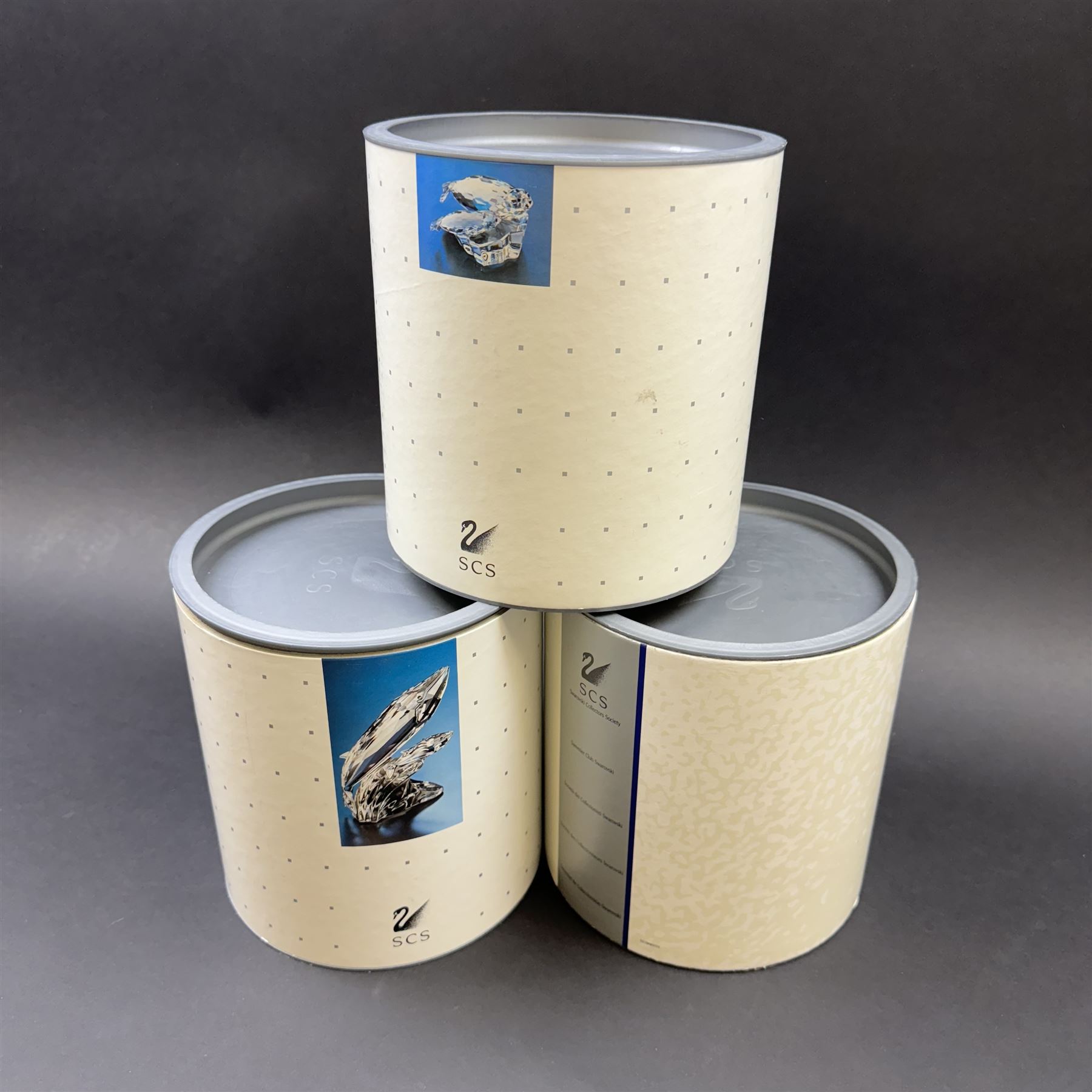 Three limited edition Swarovski Crystal figures, Care For Me, Save Me and Lead Me, all boxed with certificates 