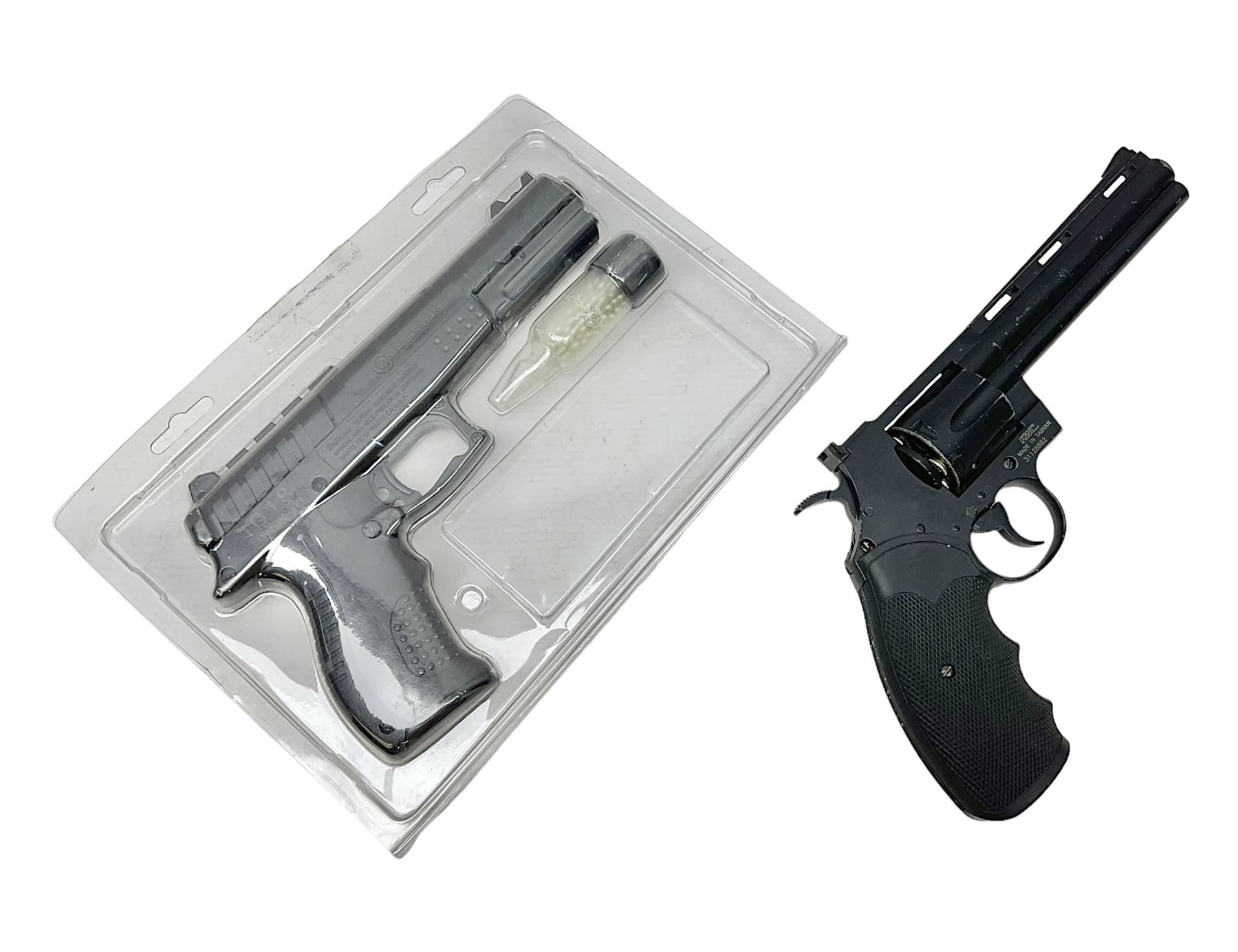 Marksman 1018 spring action BB pistol, serial no.121912951321, L27cm in original packaging with ball dispenser; and KWC .177 cal. CO2 revolver, serial no.31128882, L31cm (2)  NB: AGE RESTRICTIONS APPLY TO THE PURCHASE OF AIR WEAPONS.