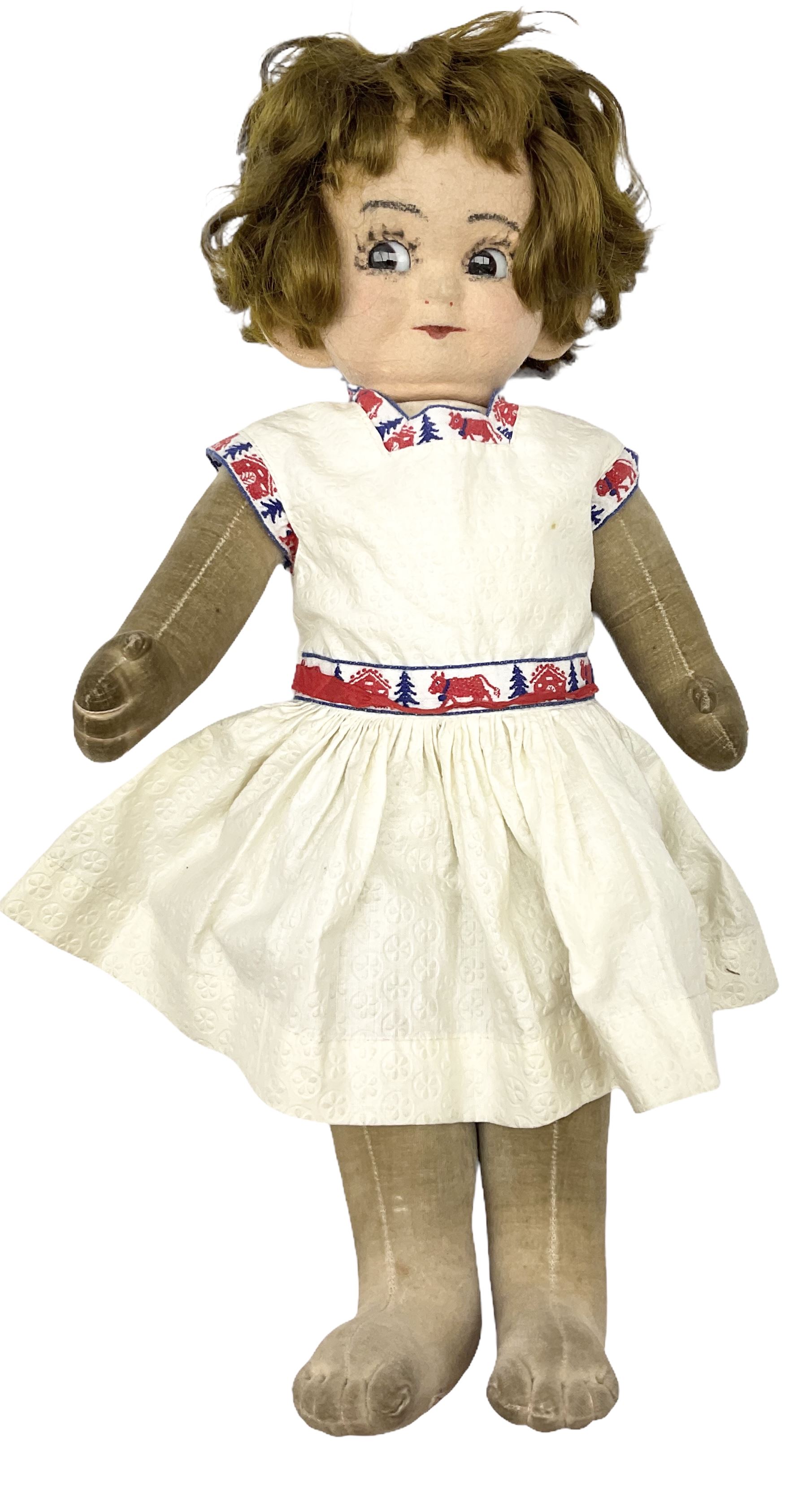 1920s Chad Valley 'Bambina' doll, the pressed felt head with applied hair, side glancing inset glass eyes, painted facial features and velvet jointed body, Hygenic and Bambina labels to the feet H46cm