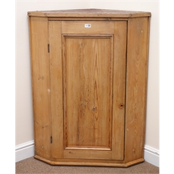  19th century pitch pine wall hanging corner cabinet, single panelled door enclosing two shelves, W84cm, H108cm, D52cm  