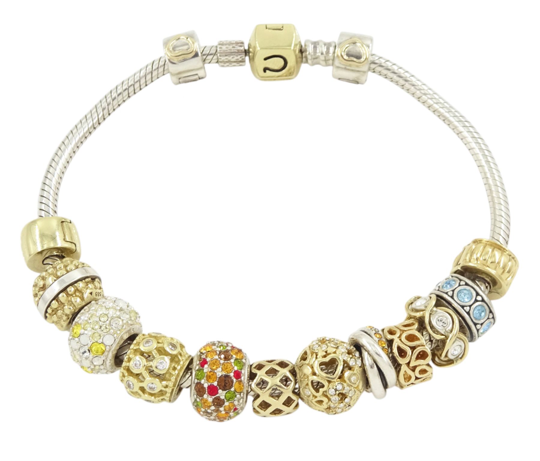Chamilia 14ct gold and silver charm bracelet, silver bracelet, with 14ct gold and silver finials, six 14ct gold charms including cubic zirconia, four silver charms and two silver and 14ctgold charms, boxed